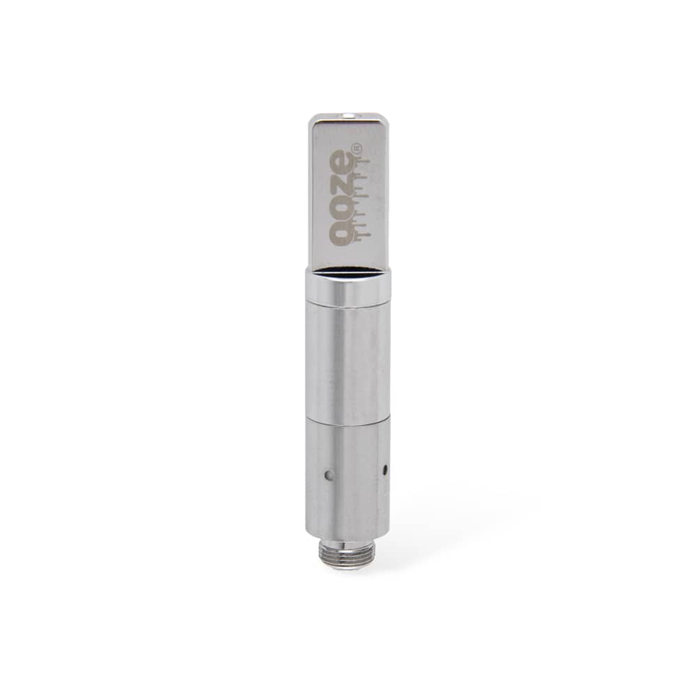 Silver cannabis oil vape cartridge with “OOZE” branding.
