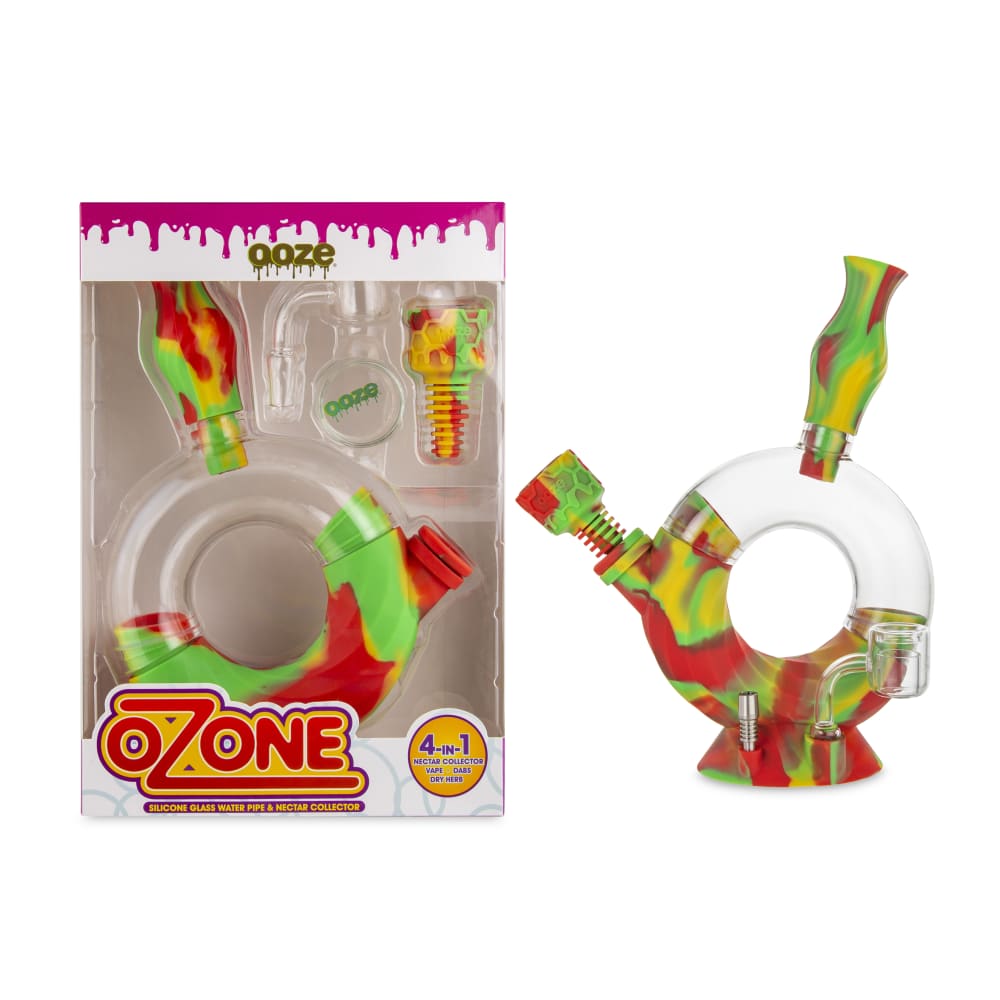Ozone silicone water pipe and nectar collector set in red and green, packaged on a clear plastic backing."