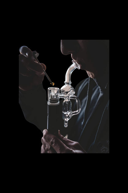 A close-up, angled view showcases the Elite Pro Hyperloop Glass with a sleek, clear design, held against a dark background.