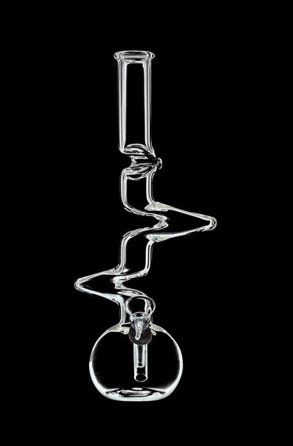 Front view of the DankStop Zig-Zag Beaker Bong, showcasing its clear glass construction and uniquely angled design.
