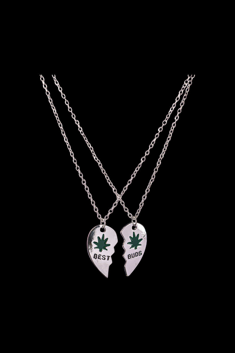 A close-up of the DankStop Best Buds Sharable Necklace, featuring two interlocking pendants on silver chains.