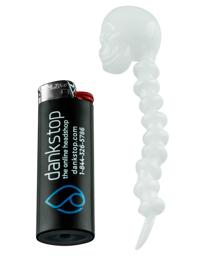 A close-up shot of the Fatality Dabber with a white handle and silver tip against a dark background.