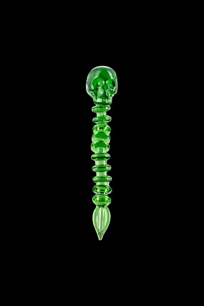 Fatality Dabber shown in a studio shot, highlighting the sleek green glass tool angled against a black backdrop.