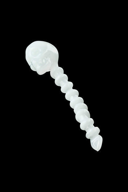 Front view of the Fatality Dabber, a metallic tool with a rounded tip, set against a dark background.