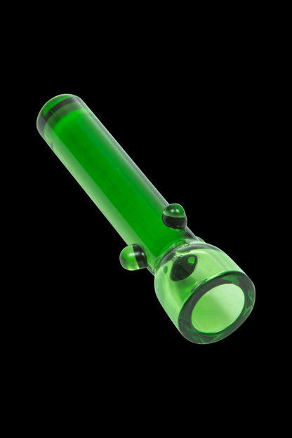 A close-up view of the Glass Nail, showcasing its smooth, green glass construction and cylindrical shape.