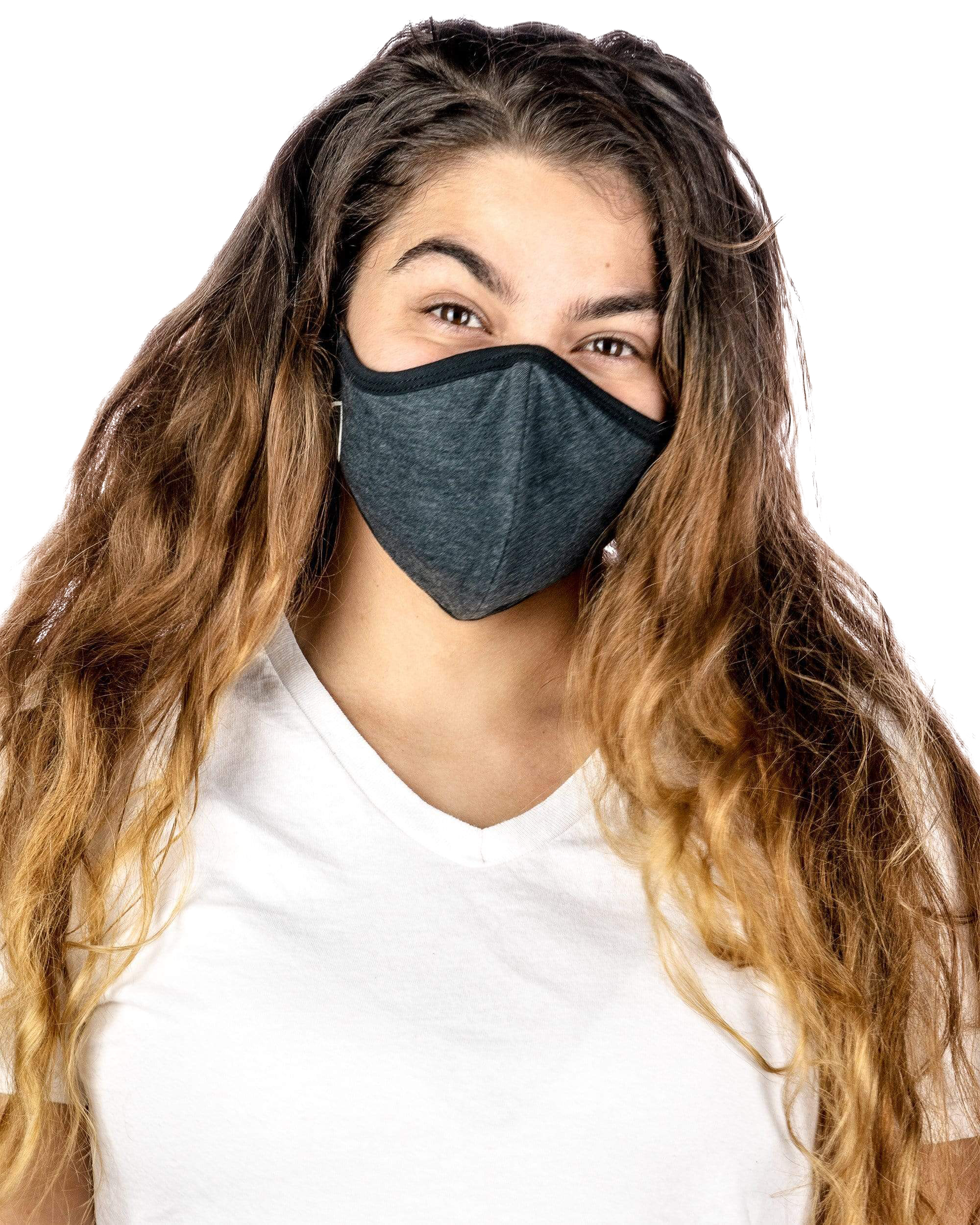 A front view of a person wearing the Reversible Cloth Mask, showcasing its simple design against a plain white background.