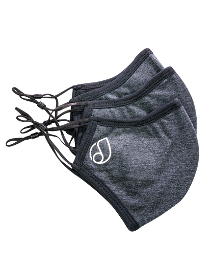 A close-up, angled view of the Reversible Cloth Mask, showcasing the folded fabric and simple design against a plain white background.