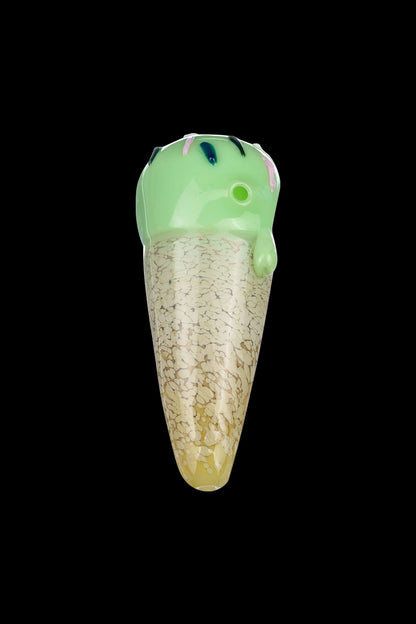 A close-up, angled view of the Single Scoop Ice Cream Spoon Pipe, showcasing its textured, golden-toned glass design.