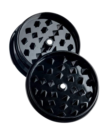 Front view of the Travel Herb Grinder & Stash Jar, showing a dark, multi-tiered grinder and clear storage jar against a plain white backdrop.