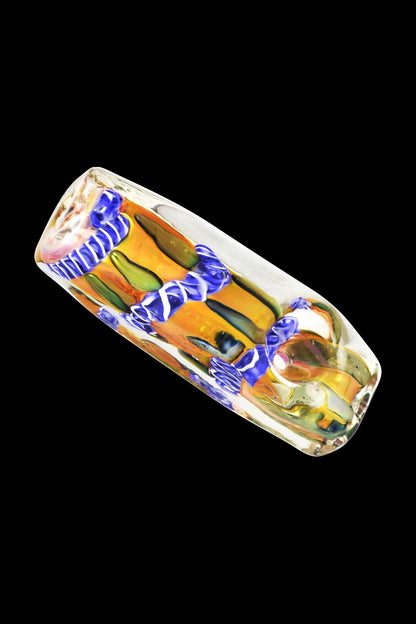 Hand-blown glass cannabis oil burner pipe with colorful floral design.