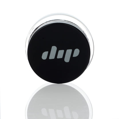 A studio shot of the Dip Devices 9mL Glass Container reflecting on a glossy surface.