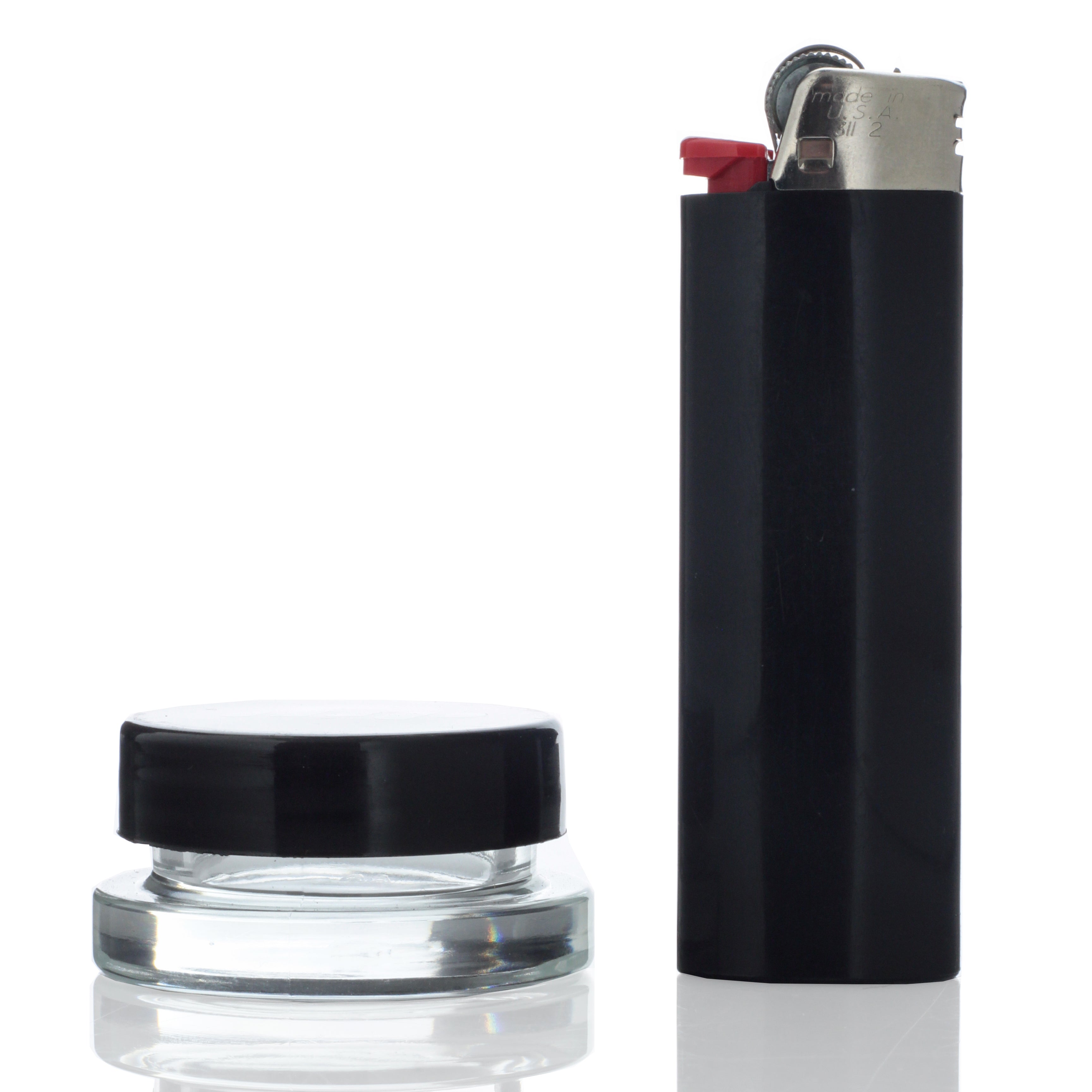 A high-angle view of the 9mL Dip Devices glass container, reflecting light on its smooth, clear surface.