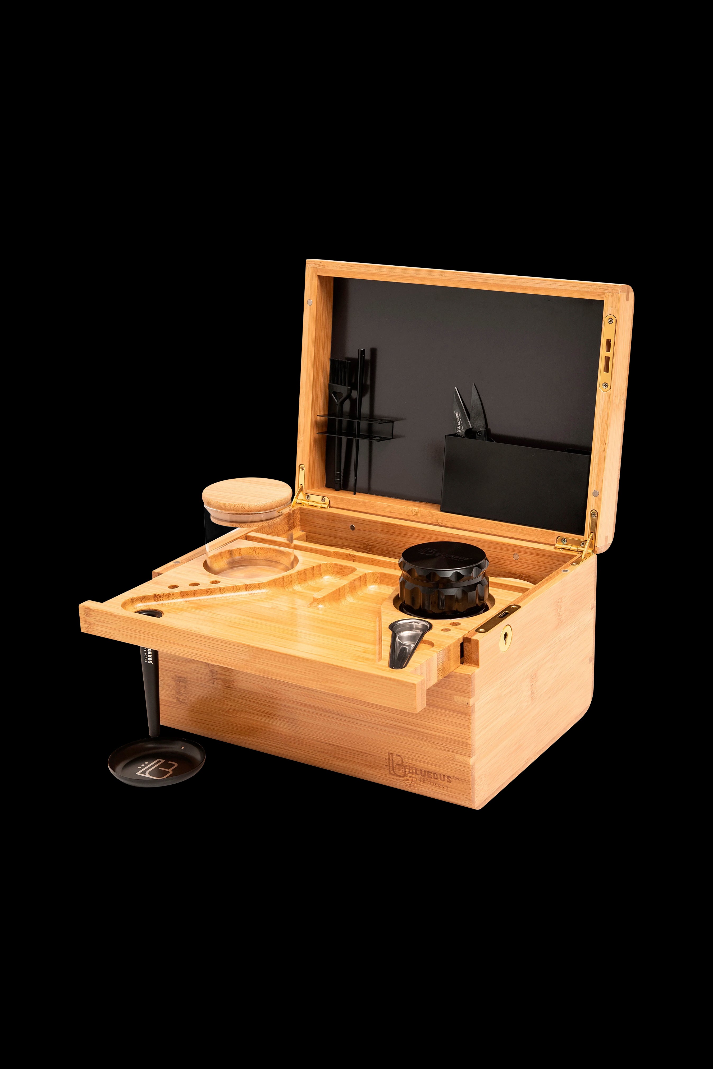 Bamboo cannabis storage box with accessories, including jars, tools, and a rolling tray.