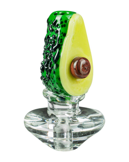 The Empire Glassworks Avocadope Carb Cap for Puffco Peak is displayed in a side view, showing a green and yellow glass cap.