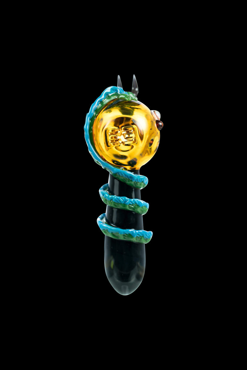 Front view of the Empire Glassworks Dragon Sphere Small Spoon Pipe with a detailed, colorful dragon head sculpted onto the bowl.