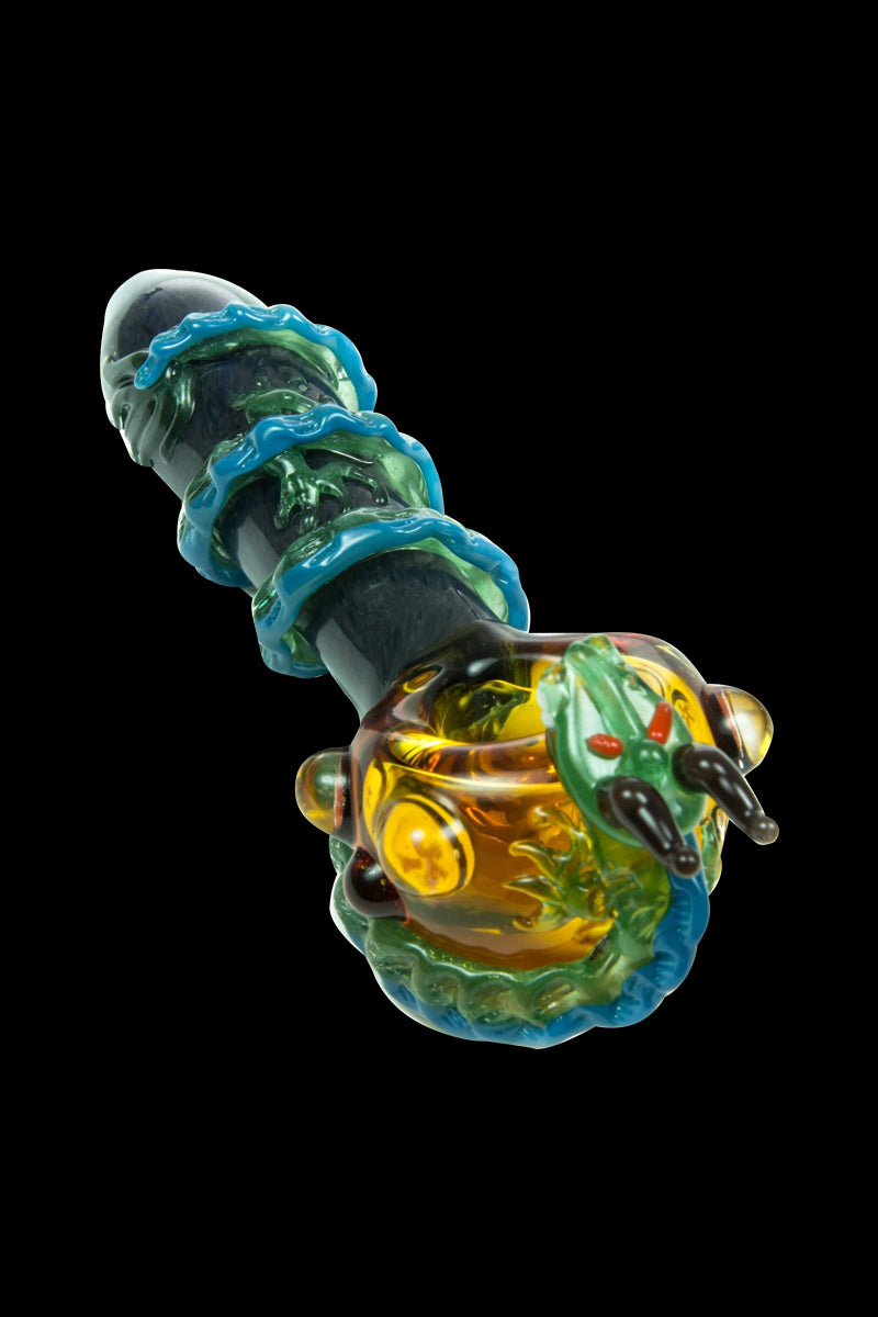 Front view of the Empire Glassworks Dragon Sphere Small Spoon Pipe, showcasing vibrant glass swirls and a detailed dragon orb design.