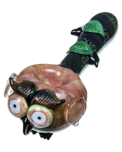 A detailed close-up of the Empire Glassworks "The Owl" Mini Glass Spoon Pipe, showing its sculpted design and dark glass finish.