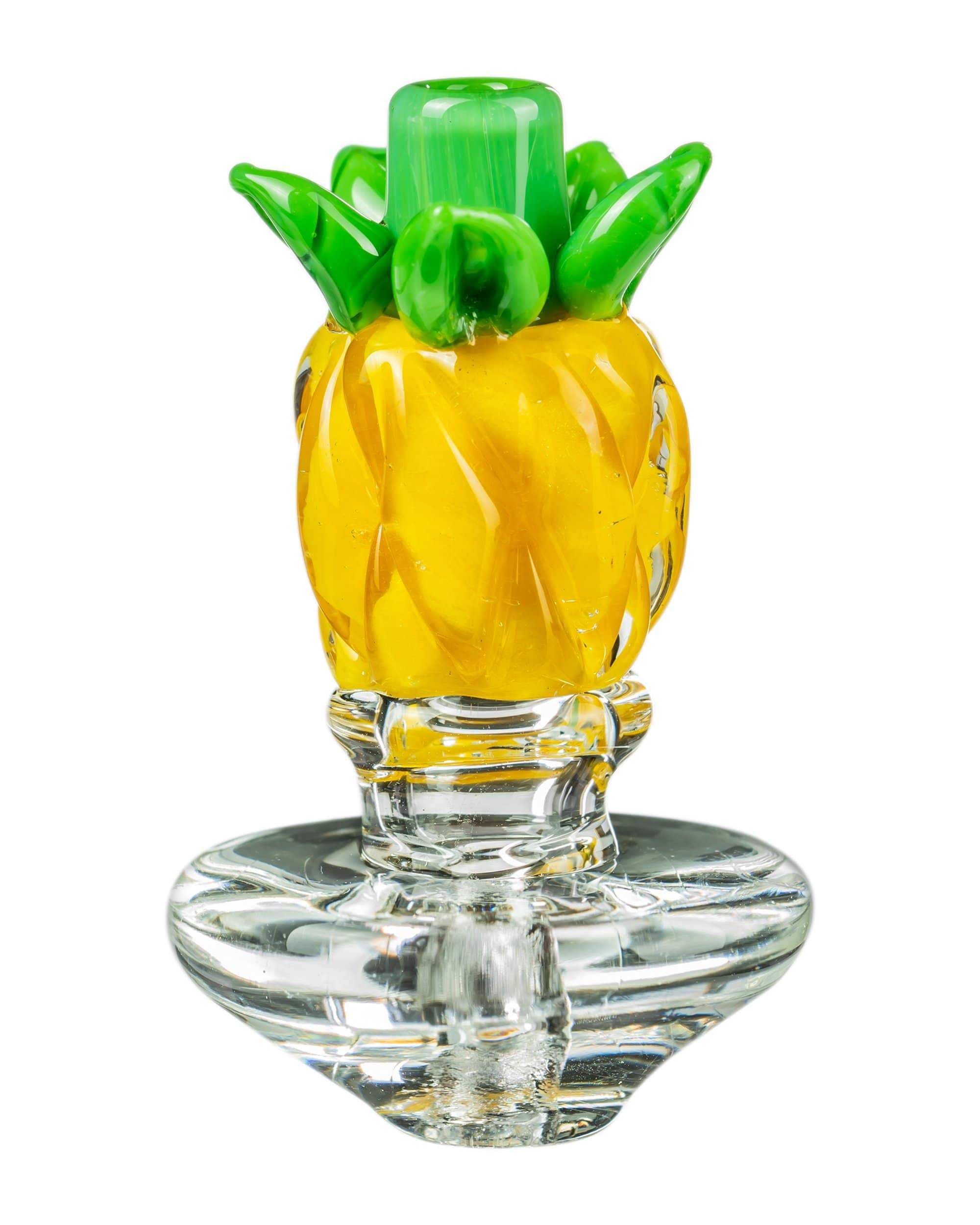 A detailed studio shot of the Pineapple Carb Cap for Puffco Peak, showing its transparent, rounded form and textured surface.