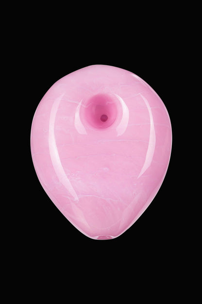A studio shot of the Empire Glassworks "Pink Panther" hand pipe, showcasing its smooth, curved form against a plain white background.