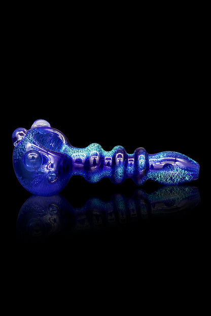 Blue glass cannabis pipe with textured body and reflective surface.