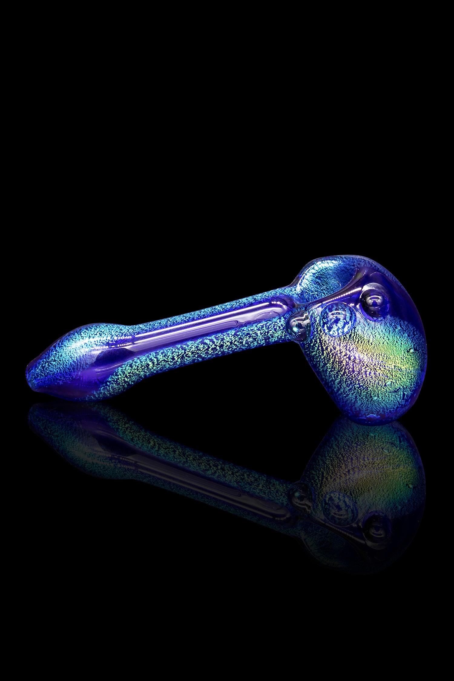 Iridescent glass pipe with a reflective surface, isolated on black.