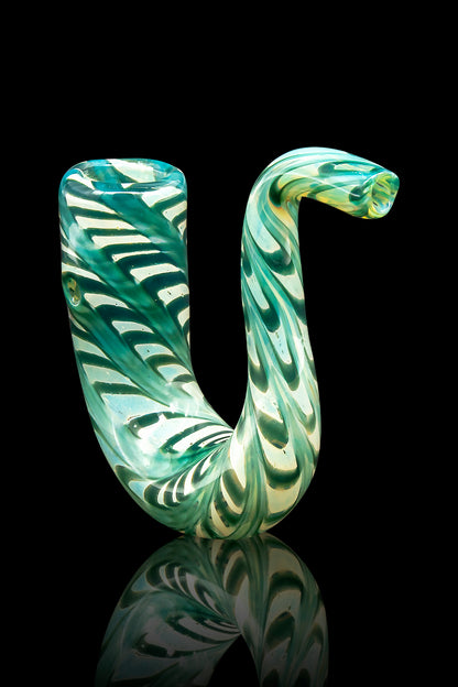 Green and white swirled glass cannabis pipe with a reflective surface.