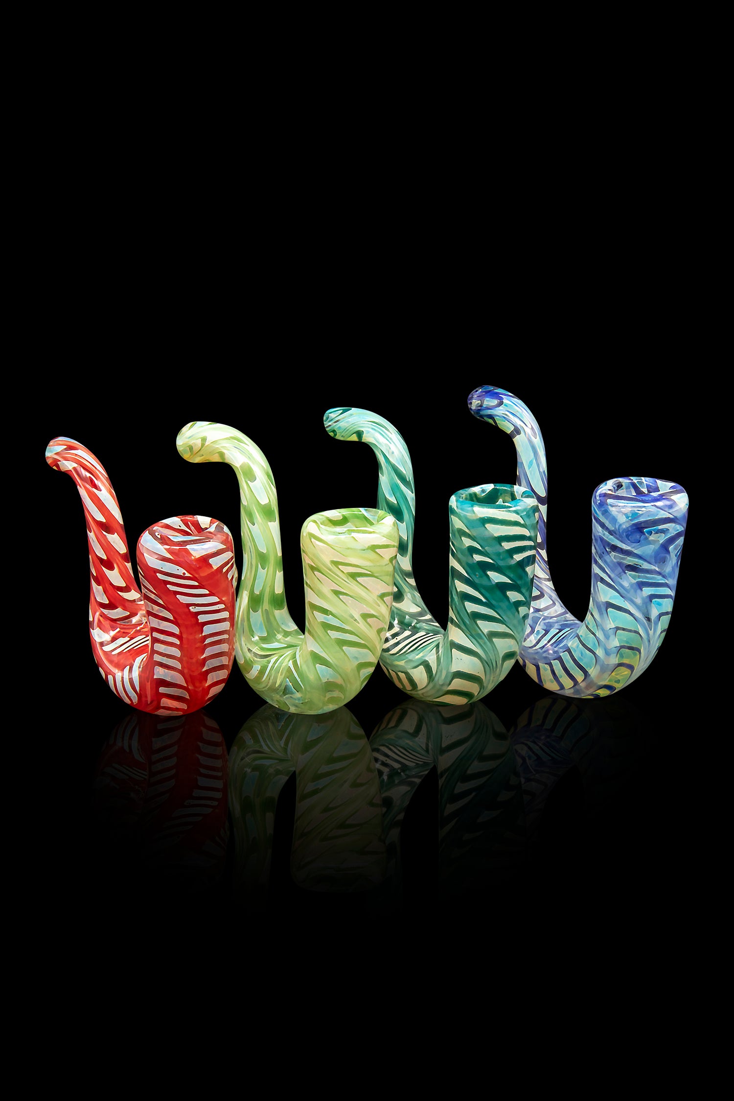 Four colorful glass pipes displayed on a reflective black surface.