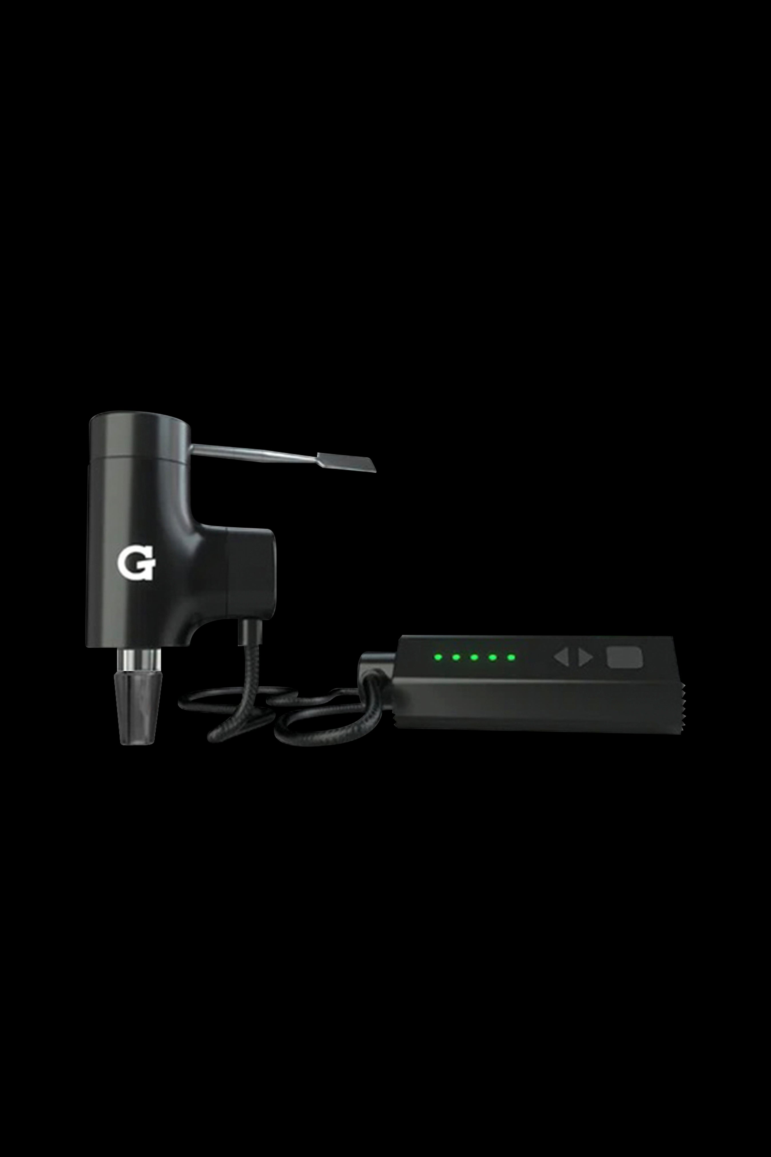Black Grenco Science G Pen Elite vaporizer with charging dock.