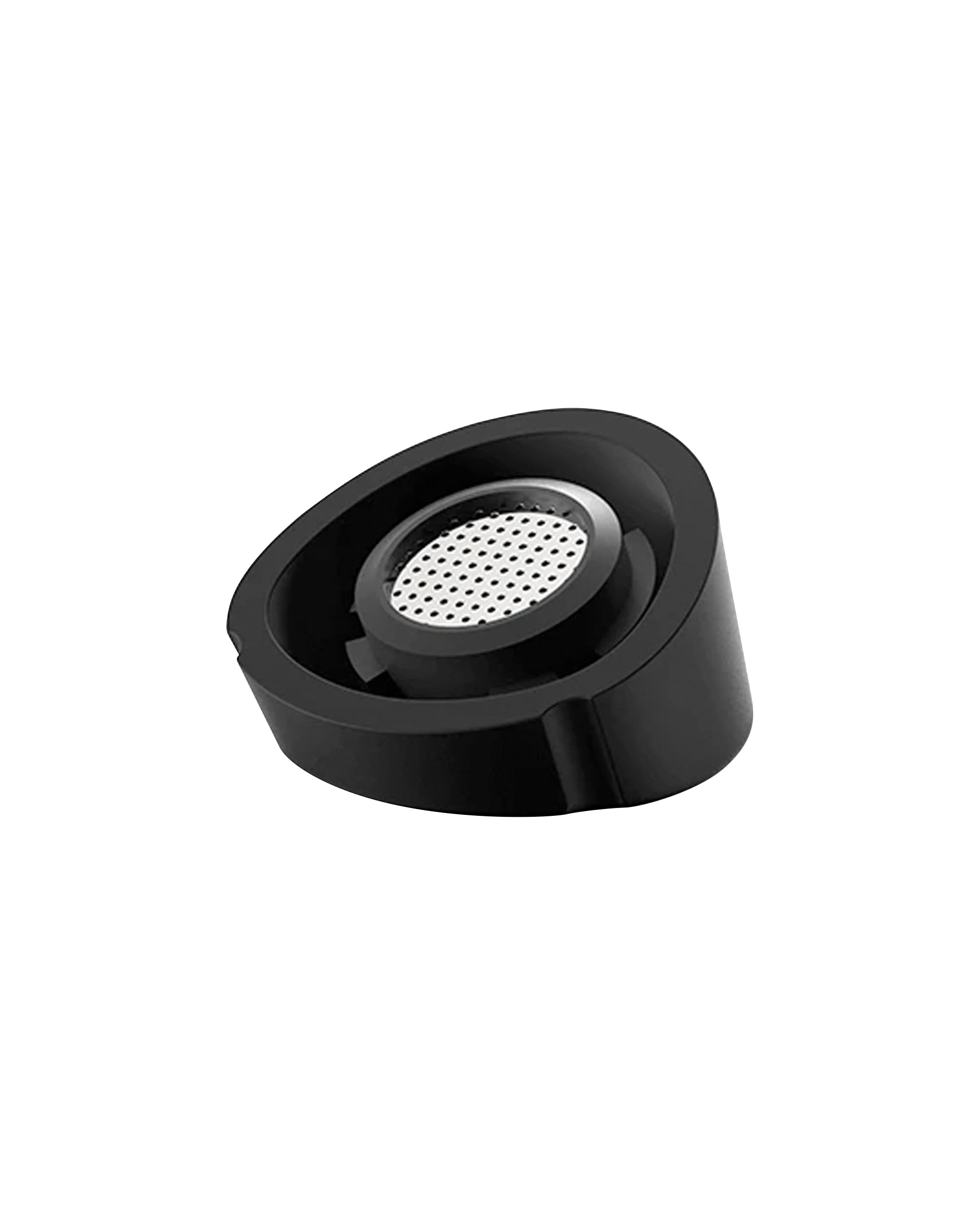 Close-up of the Pro Vaporizer, displaying a black, cylindrical shape with a visible circular inset on the top surface.