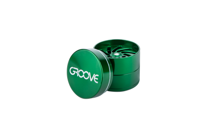 A slightly angled top view of the open Aerospaced Groove 4-Piece Aluminum Grinders, revealing its multi-tiered design.