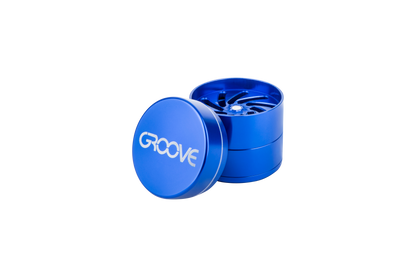 A close-up of the Aerospaced Groove 4-Piece Aluminum Grinders, showcasing its circular, metallic design against a plain white background.