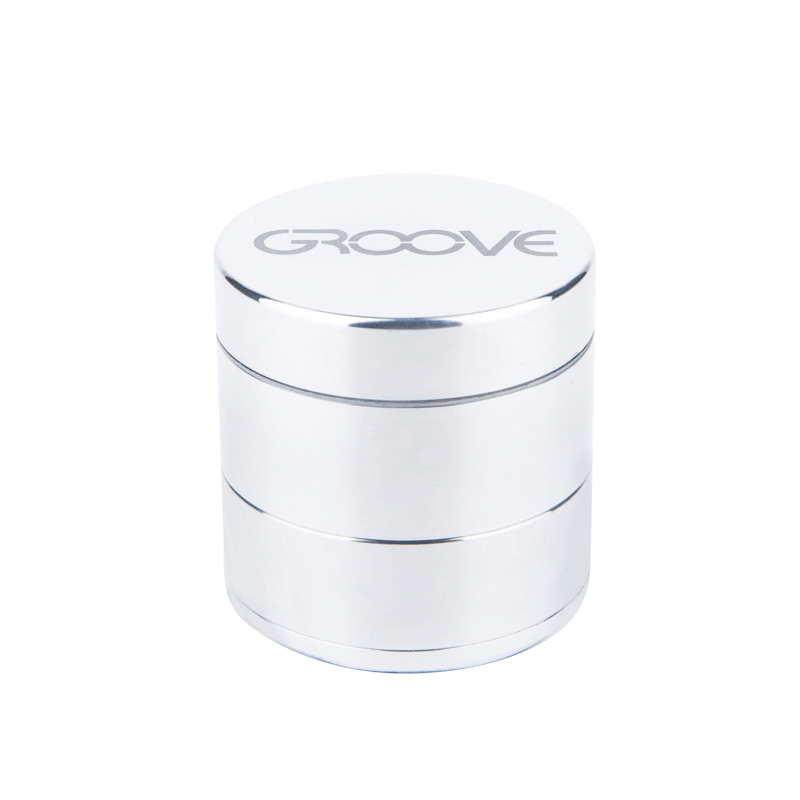 A front view of the Aerospaced Groove 4-Piece Aluminum Grinders, showing its silver metallic finish and layered cylindrical design.