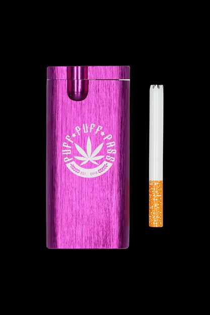 A close-up shot of the Aluminum Dugout - Large, displaying a joint within its sleek, silver casing against a dark backdrop.