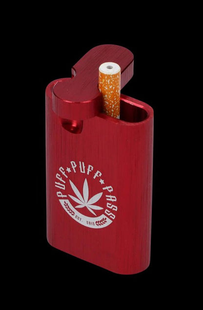 An Aluminum Dugout is shown in a close-up, angled view with a partially smoked joint inserted into its open slot.