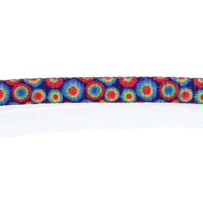 A close-up, top-down view of the HeadyPet Cat Collar, showcasing its vibrant, patterned design.