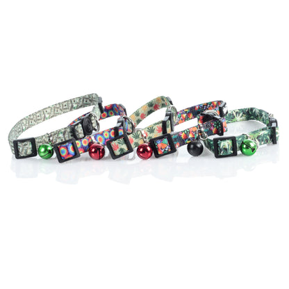 A close-up, angled view of the HeadyPet Cat Collar, showcasing its patterned design against a plain white backdrop.