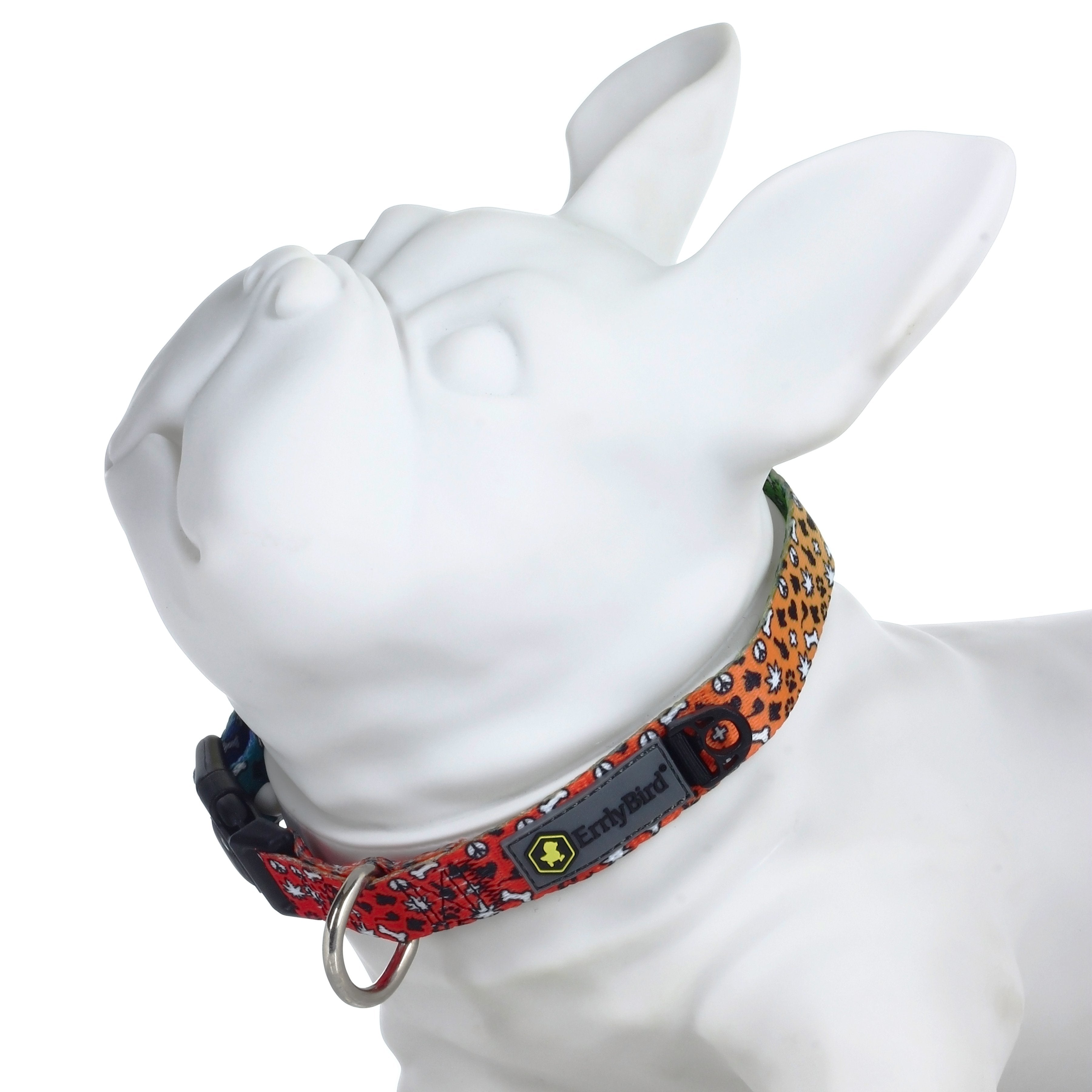 Close-up of the HeadyPet OG Collar, showcasing its patterned fabric and metallic buckle against a plain white background.