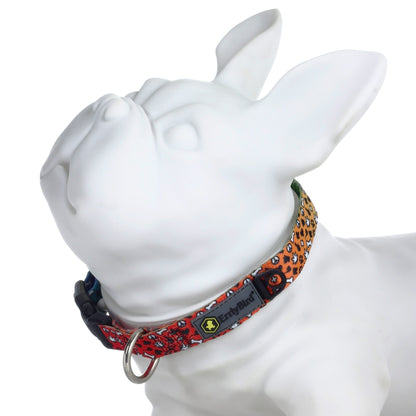 Close-up of the HeadyPet OG Collar, showcasing its patterned fabric and metallic buckle against a plain white background.