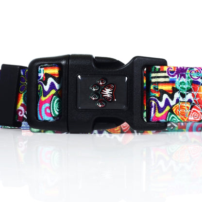 A close-up, angled view of the HeadyPet OG Collar, showcasing its patterned fabric and black plastic buckle.