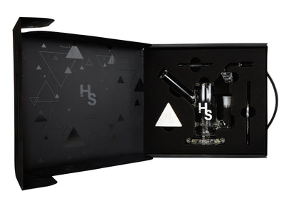 A front view of the Higher Standards Heavy Duty Rig on a black background with a geometric pattern.