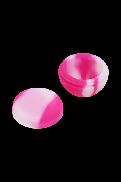 A close-up of the Silicone Half Moon 9ml Stash Container, showcasing its rounded shape and smooth surface against a plain background.