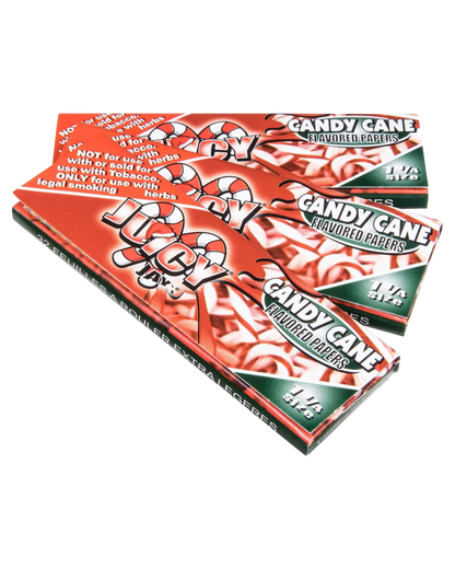 A close-up of Juicy Jay's Classic Size Flavored Rolling Papers with colorful floral designs against a white background.