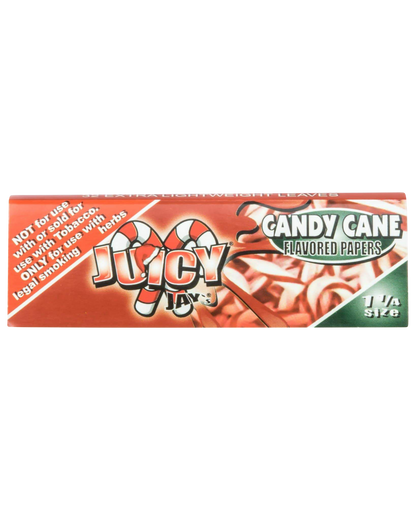 A close-up of Juicy Jay's Classic Size Flavored Rolling Papers, showing a colorful, patterned packet against a dark background.