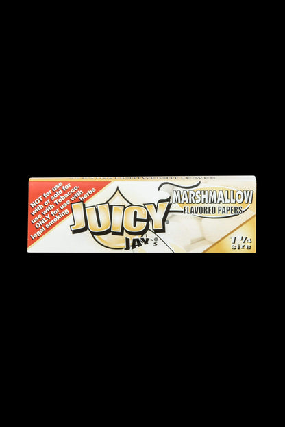 A close-up of Juicy Jay's Classic Size Flavored Rolling Papers package with bold lettering and colorful designs.