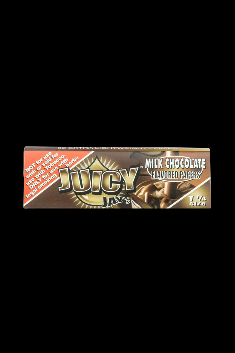 A close-up, angled view of a pack of Juicy Jay's Classic Size Flavored Rolling Papers with colorful branding and text details.