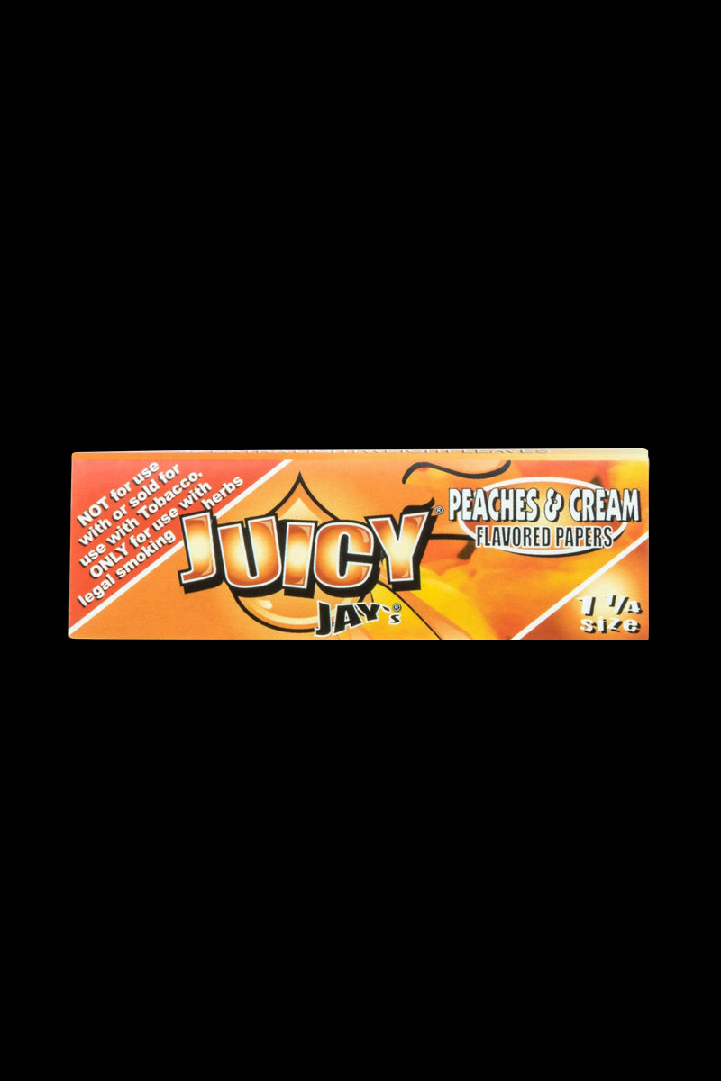 A close-up of the packaging for Juicy Jay's Classic Size Flavored Rolling Papers, displaying a colorful, patterned design.