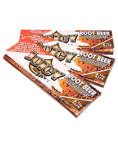 A close-up of a package of Juicy Jay's Classic Size Flavored Rolling Papers, angled slightly to show the colorful branding.