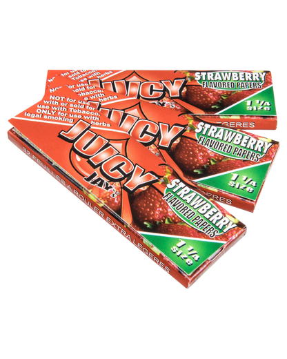 A close-up, angled view of a pack of Juicy Jay's Classic Size Flavored Rolling Papers displaying colorful fruit-themed branding.