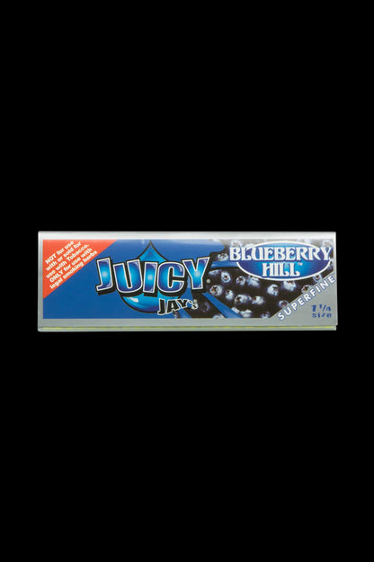 A close-up of the Juicy Jay's Superfine 1-1/4" flavored rolling papers package, showing bold blue and white branding with a glossy finish.