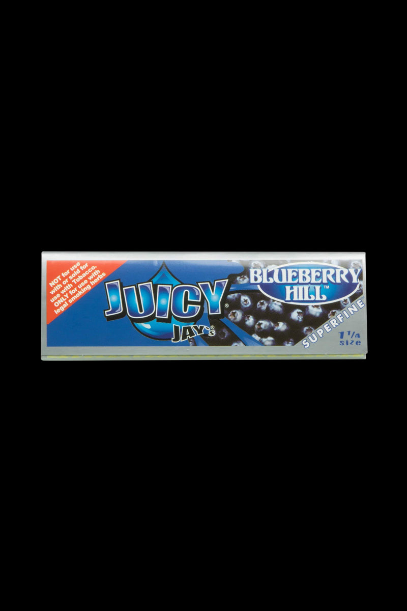 A close-up of the Juicy Jay's Superfine 1-1/4" flavored rolling papers package, showing bold blue and white branding with a glossy finish.